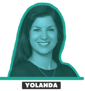 A headshot photo of Yolanda in teal